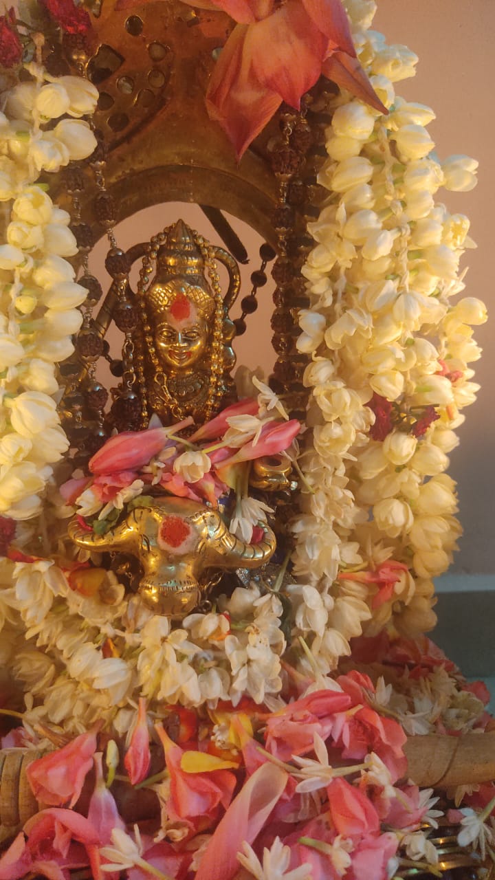 Temple deity adorned with flowers in Chennai