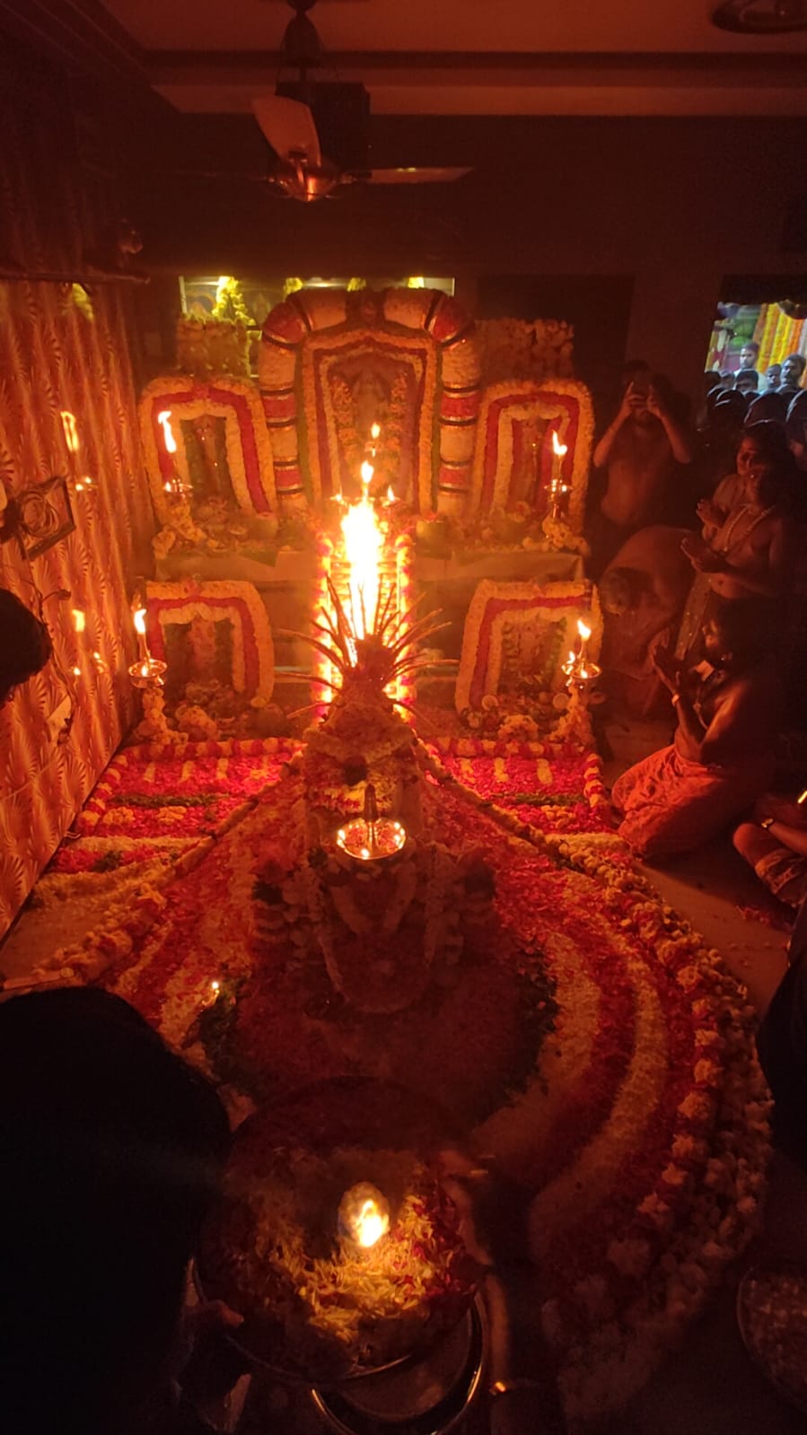 Temple ritual with central fire and devotees in Chennai